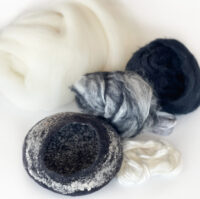felting kit for beginners, felted pod in black and white merino felting wool roving wool tops.