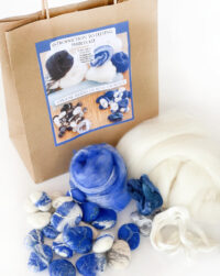 felting kit for beginners felted pebbles with blue merino felting wool roving wool tops.