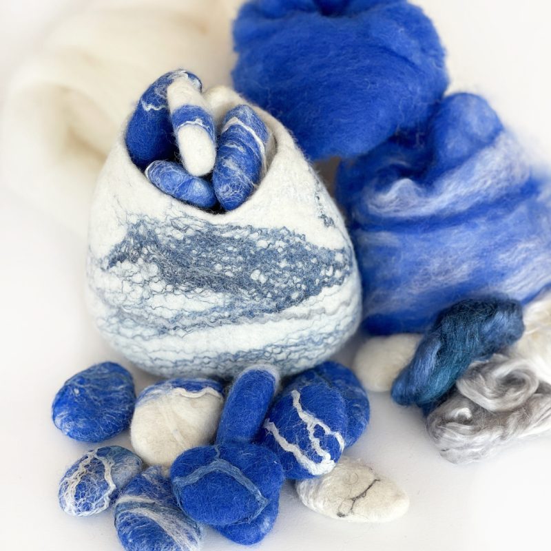 felting kits for beginners felted pod and felted pebbles, with blue and white merino felting wool roving wool top